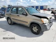 ✅ 2006 Honda CR-V LX • VIN: JHLRD78576C039599 • Lot: 82133845. Listed on Copart with 220,890 mi. Free auction sales archive from the USA and detailed vehicle history report at DreamBid. Image 4.