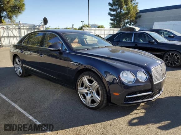 ✅ 2015 Bentley Flying Spur • VIN: SCBEC9ZA1FC049618 • Лот: 77380014. Опубликован ранее на Copart с пробегом 85 979 миль. Бесплатный доступ к архиву аукционных продаж из США и подробный отчёт об истории автомобиля на DreamBid. Изображение 4.