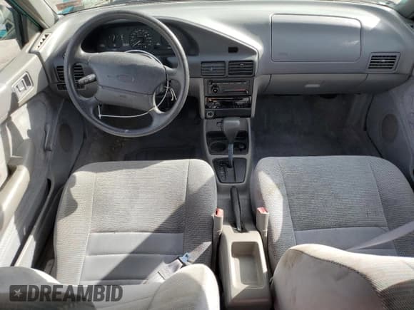 ✅ 1995 Ford Escort • VIN: 1FASP14J9SW128191 • Lot: 75688724. Wystawiony na Copart z przebiegiem 85 423 mil. Bezpłatny archiwum sprzedaży aukcyjnych z USA i szczegółowy raport historii pojazdu na DreamBid. Zdjęcie 8.