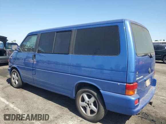✅ 2003 Volkswagen EuroVan GLS • VIN: WV2KB470X3H028721 • Lot: 57531425. Listed on Copart with 233,629 mi. Free auction sales archive from the USA and detailed vehicle history report at DreamBid. Image 2.