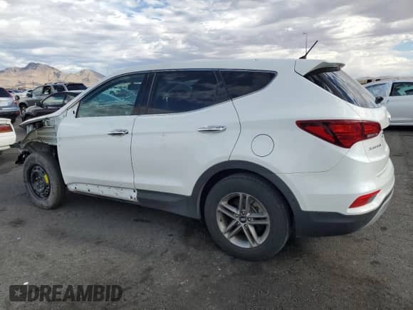 2018 Hyundai Santa Fe 2.4L с VIN 5NMZT3LB7JH084297, выставлен на аукционе Copart как лот 82673785 с пробегом 33 181 миль миль и Списание • Salvage title. История ставок и продаж доступна на DreamBid. Изображение 2.