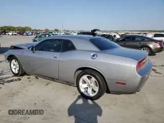 ✅ 2014 Dodge Challenger SXT • VIN: 2C3CDYAG1EH105147 • Lot: 75892144. Wystawiony na Copart z przebiegiem 200 055 mil. Bezpłatny archiwum sprzedaży aukcyjnych z USA i szczegółowy raport historii pojazdu na DreamBid. Zdjęcie 2.