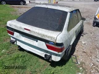 ✅ 1989 Ford Escort • VIN: 1FAPP9591KT185723 • Лот: 42257967. Опубликован ранее на IAAI с пробегом 318 953 миль. Бесплатный доступ к архиву аукционных продаж из США и подробный отчёт об истории автомобиля на DreamBid. Изображение 4.