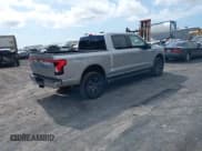 ✅ 2023 Ford F-150 Lightning Pro • VIN: 1FT6W1EV8PWG59244 • Lot: 42631226. Listed on IAAI with 13,682 mi. Free auction sales archive from the USA and detailed vehicle history report at DreamBid. Image 4.