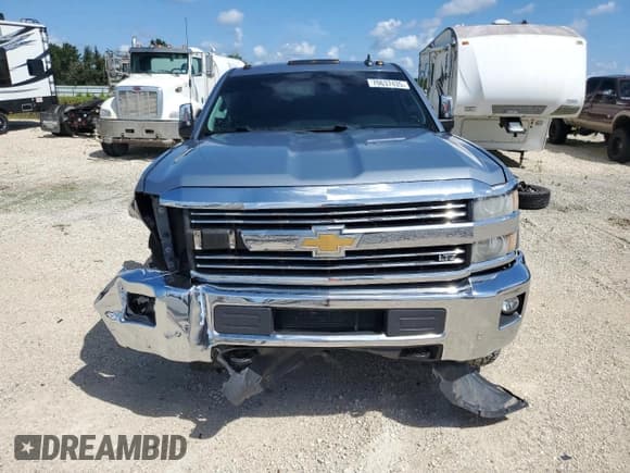 ✅ 2015 Chevrolet Silverado 3500HD LTZ • VIN: 1GC4K0E82FF605587 • Lot: 70637435. Listed on Copart with 151,106 mi. Free auction sales archive from the USA and detailed vehicle history report at DreamBid. Image 5.