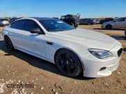 ✅ 2017 BMW M6 • VIN: WBS6E9C54HG437454 • Лот: 94077035. Опубликован ранее на Copart с пробегом 66 029 миль. Бесплатный доступ к архиву аукционных продаж из США и подробный отчёт об истории автомобиля на DreamBid. Изображение 4.