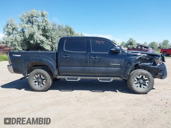✅ 2012 Toyota Tacoma PreRunner • VIN: 3TMJU4GN8CM136850 • Lot: 42767423. Listed on IAAI with 128,151 mi. Free auction sales archive from the USA and detailed vehicle history report at DreamBid. Image 14.