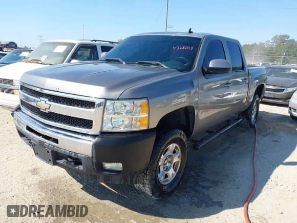 2007 Chevrolet Silverado 1500 LTZ with VIN 2GCFK13Y371712075, listed as a IAAI auction lot 43282513 with 242,495 mi miles and . Bid and sale history available at DreamBid. Image 17.