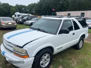 ✅ 2000 Chevrolet Blazer LS • VIN: 1GNCT18W9YK199205 • Lot: 70046285. Wystawiony na Copart z przebiegiem 137 755 mil. Bezpłatny archiwum sprzedaży aukcyjnych z USA i szczegółowy raport historii pojazdu na DreamBid. Zdjęcie 2.