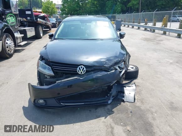 ✅ 2012 Volkswagen Jetta TDI • VIN: 3VWLL7AJ0CM321264 • Lot: 42278500. Listed on IAAI with 161,666 mi. Free auction sales archive from the USA and detailed vehicle history report at DreamBid. Image 12.