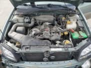 ✅ 2003 Subaru Legacy Outback • VIN: 4S3BH665937644454 • Lot: 57404695. Listed on Copart with 242,345 mi. Free auction sales archive from the USA and detailed vehicle history report at DreamBid. Image 11.