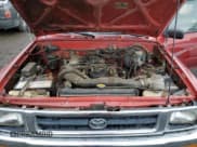 ✅ 1994 Toyota Pickup DX • VIN: 4TARN01P7RZ277284 • Лот: 84396245. Опубликован ранее на Copart с пробегом 289 299 миль. Бесплатный доступ к архиву аукционных продаж из США и подробный отчёт об истории автомобиля на DreamBid. Изображение 11.