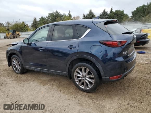 ✅ 2019 Mazda CX-5 Grand Touring Reserve • VIN: JM3KFBDY5K0623563 • Лот: 87201865. Опубликован ранее на Copart с пробегом 46 313 миль. Бесплатный доступ к архиву аукционных продаж из США и подробный отчёт об истории автомобиля на DreamBid. Изображение 2.