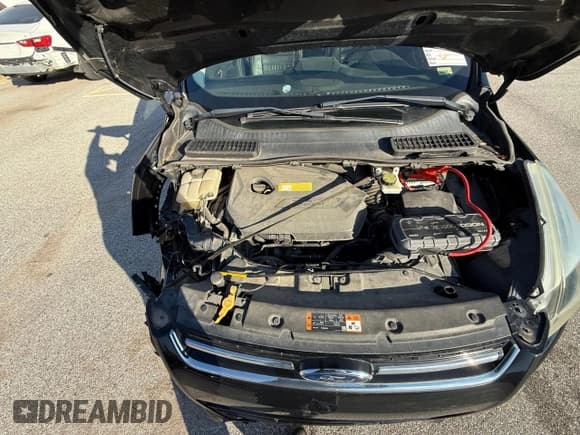 ✅ 2016 Ford Escape Titanium • VIN: 1FMCU0JX0GUA74577 • Lot: 80205944. Wystawiony na Copart z przebiegiem 104 781 mil. Bezpłatny archiwum sprzedaży aukcyjnych z USA i szczegółowy raport historii pojazdu na DreamBid. Zdjęcie 7.