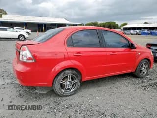 ✅ 2011 Chevrolet Aveo 2LT • VIN: KL1TG5DEXBB129745 • Lot: 82353045. Wystawiony na Copart z przebiegiem 96 515 mil. Bezpłatny archiwum sprzedaży aukcyjnych z USA i szczegółowy raport historii pojazdu na DreamBid. Zdjęcie 3.