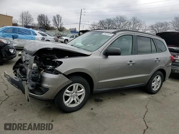 ✅ 2011 Hyundai Santa Fe GLS • VIN: 5XYZGDAG2BG019619 • Lot: 86691604. Listed on Copart with 125,338 mi. Free auction sales archive from the USA and detailed vehicle history report at DreamBid. Image 12.
