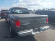 ✅ 2003 Dodge Dakota SLT • VIN: 1D7HL48N23S247441 • Lot: 41359296. Wystawiony na IAAI z przebiegiem 58 414 mil. Bezpłatny archiwum sprzedaży aukcyjnych z USA i szczegółowy raport historii pojazdu na DreamBid. Zdjęcie 3.