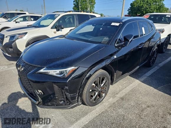 ✅ 2022 Lexus UX 200 F Sport • VIN: JTHE3JBHXN2048556 • Лот: 53814865. Опубликован ранее на Copart с пробегом 199 622 миль. Бесплатный доступ к архиву аукционных продаж из США и подробный отчёт об истории автомобиля на DreamBid. Изображение 2.