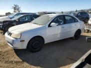 ✅ 2004 Suzuki Forenza S • VIN: KL5JD52Z14K950658 • Lot: 74824154. Listed on Copart with 99,150 mi. Free auction sales archive from the USA and detailed vehicle history report at DreamBid. Image 1.