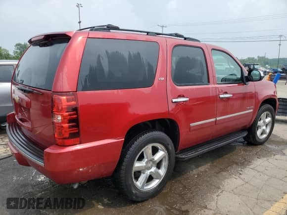 2013 Chevrolet Tahoe LTZ z VIN 1GNSKCE06DR211595, wystawiony jako Copart lot #67392565 z przebiegiem 202 317 mil mil oraz Szkoda całkowita • Salvage title. Historia ofert i sprzedaży dostępna na DreamBid. Obrazek 3.