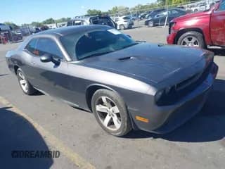 2013 Dodge Challenger SXT with VIN 2C3CDYAGXDH675016, listed as a IAAI auction lot 43325216 with 129,120 mi miles and . Bid and sale history available at DreamBid. Image 1.