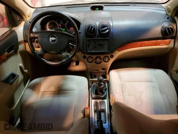 2009 Chevrolet Aveo 1LT z VIN KL1TD66E79B646149, wystawiony jako Copart lot #87581235 z przebiegiem 156 634 mil mil oraz Szkoda całkowita • Salvage title. Historia ofert i sprzedaży dostępna na DreamBid. Obrazek 8.