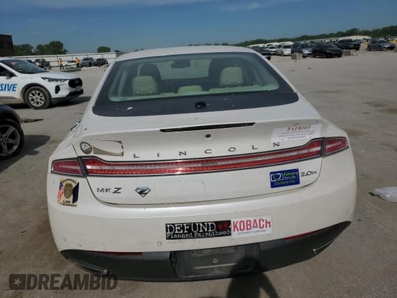 ✅ 2014 Lincoln MKZ Hybrid • VIN: 3LN6L2LU1ER814205 • Lot: 56635925. Wystawiony na Copart z przebiegiem 128 884 mil. Bezpłatny archiwum sprzedaży aukcyjnych z USA i szczegółowy raport historii pojazdu na DreamBid. Zdjęcie 6.