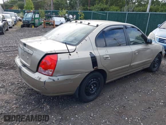 2005 Hyundai Elantra GLS z VIN KMHDN46D85U123335, wystawiony jako IAAI lot #43254224 z przebiegiem Nie podano mil oraz . Historia ofert i sprzedaży dostępna na DreamBid. Obrazek 4.