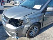 ✅ 2015 Dodge Grand Caravan SXT • VIN: 2C4RDGCG5FR733575 • Lot: 42647763. Wystawiony na IAAI z przebiegiem 279 285 mil. Bezpłatny archiwum sprzedaży aukcyjnych z USA i szczegółowy raport historii pojazdu na DreamBid. Zdjęcie 6.