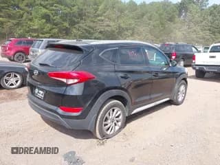 ✅ 2017 Hyundai Tucson SE • VIN: KM8J33A44HU528798 • Лот: 40413713. Опубликован ранее на IAAI с пробегом 97 011 миль. Бесплатный доступ к архиву аукционных продаж из США и подробный отчёт об истории автомобиля на DreamBid. Изображение 4.
