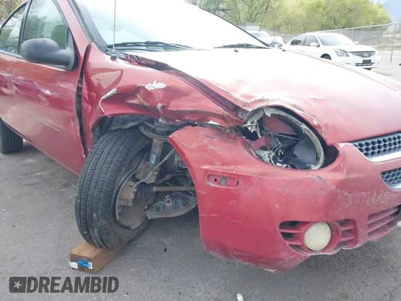 2004 Dodge Neon SXT z VIN 1B3ES56C04D504384, wystawiony jako IAAI lot #41988581 z przebiegiem 166 602 mil mil oraz . Historia ofert i sprzedaży dostępna na DreamBid. Obrazek 6.