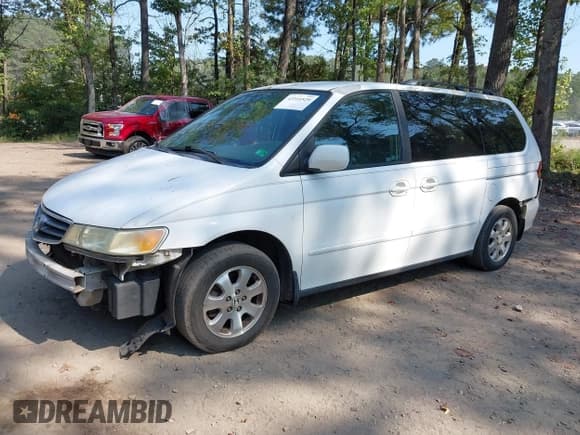 ✅ 2004 Honda Odyssey EX-L • VIN: 5FNRL18924B078634 • Lot: 43310529. Listed on IAAI with 249,022 mi. Free auction sales archive from the USA and detailed vehicle history report at DreamBid. Image 18.