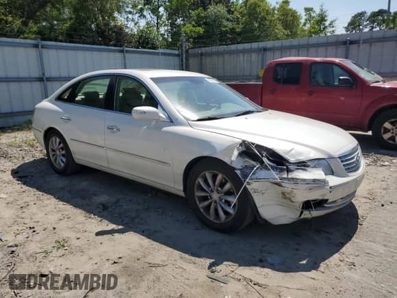 2007 Hyundai Azera SE с VIN KMHFC46FX7A177143, выставлен на аукционе Copart как лот 57519425 с пробегом 104 711 миль миль и Списание • Salvage title. История ставок и продаж доступна на DreamBid. Изображение 4.