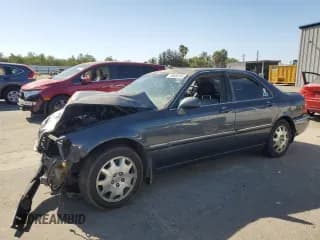 ✅ 2004 Acura RL w/Navigation System • VIN: JH4KA96614C006186 • Lot: 69606265. Wystawiony na Copart z przebiegiem Nie podano. Bezpłatny archiwum sprzedaży aukcyjnych z USA i szczegółowy raport historii pojazdu na DreamBid. Zdjęcie 1.