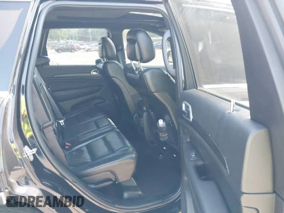 2021 Jeep Grand Cherokee 80th Anniversary with VIN 1C4RJEBG3MC679259, listed as a IAAI auction lot 42929896 with 87,832 mi miles and . Bid and sale history available at DreamBid. Image 8.