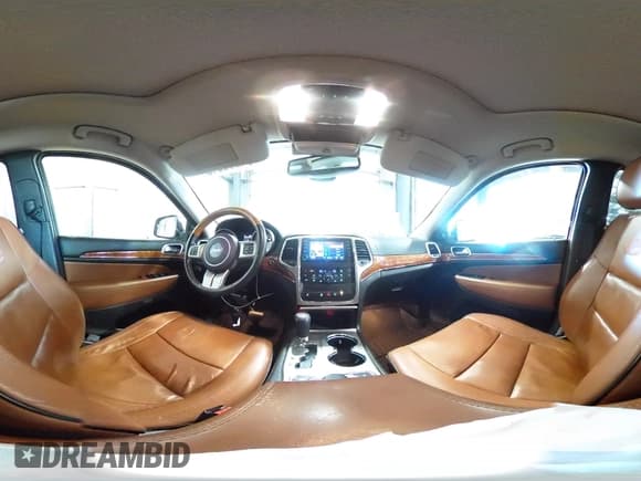 ✅ 2012 Jeep Grand Cherokee Overland • VIN: 1C4RJFCG7CC324310 • Lot: 84262345. Listed on Copart with 155,354 mi. Free auction sales archive from the USA and detailed vehicle history report at DreamBid. Image 16.