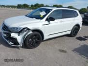 ✅ 2023 Volkswagen Tiguan SE R-Line Black • VIN: 3VVCB7AX0PM090710 • Lot: 41256904. Wystawiony na IAAI z przebiegiem 12 819 mil. Bezpłatny archiwum sprzedaży aukcyjnych z USA i szczegółowy raport historii pojazdu na DreamBid. Zdjęcie 2.