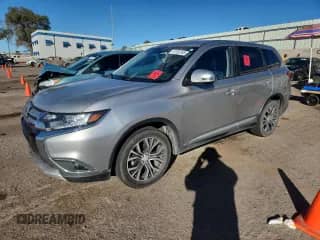 2018 Mitsubishi Outlander SE with VIN JA4AD3A39JJ004198, listed as a Copart auction lot 87282365 with 140,590 mi miles and Clean title. Bid and sale history available at DreamBid. Image 1.