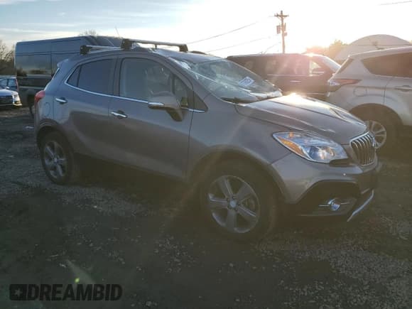 ✅ 2014 Buick Encore Convenience • VIN: KL4CJBSB6EB546263 • Lot: 91736025. Listed on Copart with 43,825 mi. Free auction sales archive from the USA and detailed vehicle history report at DreamBid. Image 4.
