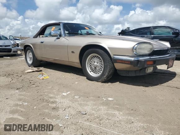 ✅ 1993 Jaguar XJS • VIN: SAJNW474XPC186032 • Lot: 59872195. Listed on Copart with 81,739 mi. Free auction sales archive from the USA and detailed vehicle history report at DreamBid. Image 4.