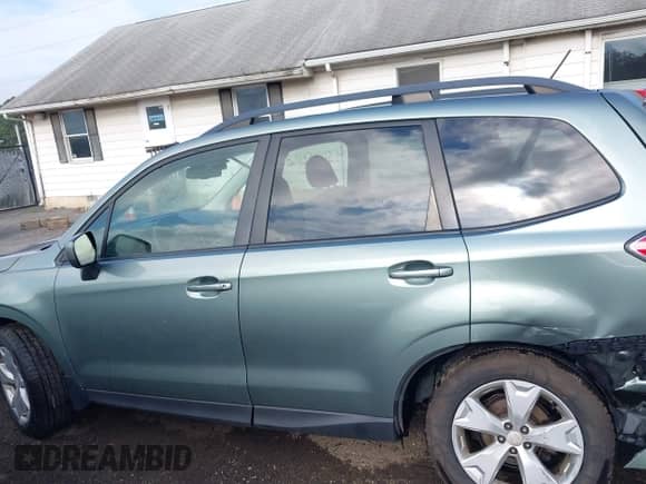2015 Subaru Forester Premium z VIN JF2SJADC4FH530399, wystawiony jako IAAI lot #43165008 z przebiegiem 81 872 mil mil oraz . Historia ofert i sprzedaży dostępna na DreamBid. Obrazek 14.