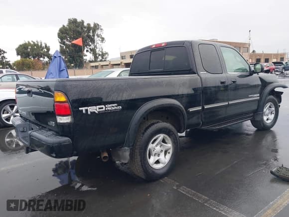 ✅ 2002 Toyota Tundra Limited • VIN: 5TBRT38142S304891 • Lot: 43691813. Listed on IAAI with 226,082 mi. Free auction sales archive from the USA and detailed vehicle history report at DreamBid. Image 4.