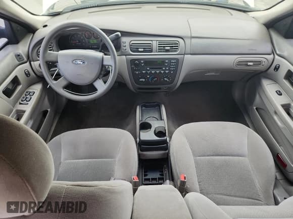 ✅ 2005 Ford Taurus SE • VIN: 1FAFP53215A244179 • Lot: 82070545. Listed on Copart with 105,426 mi. Free auction sales archive from the USA and detailed vehicle history report at DreamBid. Image 8.