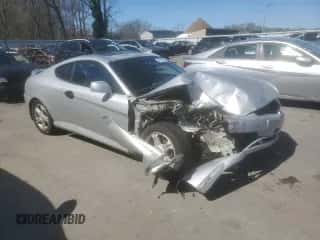 2003 Hyundai Tiburon z VIN KMHHM65D03U056017, wystawiony jako Copart lot #49678695 z przebiegiem 99 729 mil mil oraz Szkoda całkowita • Salvage title. Historia ofert i sprzedaży dostępna na DreamBid. Obrazek 4.