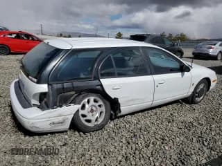 ✅ 2000 Saturn SW • VIN: 1G8ZJ8279YZ118174 • Лот: 48820105. Опубликован ранее на Copart с пробегом 205 882 миль. Бесплатный доступ к архиву аукционных продаж из США и подробный отчёт об истории автомобиля на DreamBid. Изображение 3.