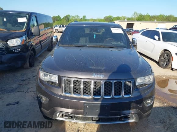 ✅ 2014 Jeep Grand Cherokee Overland • VIN: 1C4RJFCT3EC266101 • Lot: 39184826. Listed on IAAI with 141,512 mi. Free auction sales archive from the USA and detailed vehicle history report at DreamBid. Image 12.