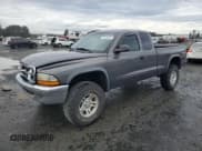 ✅ 2004 Dodge Dakota SLT • VIN: 1D7HG42N24S718101 • Lot: 79378334. Wystawiony na Copart z przebiegiem 165 859 mil. Bezpłatny archiwum sprzedaży aukcyjnych z USA i szczegółowy raport historii pojazdu na DreamBid. Zdjęcie 1.