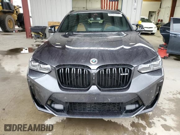 ✅ 2022 BMW X4 M • VIN: 5YM23EC01N9N39875 • Lot: 66325504. Wystawiony na Copart z przebiegiem 35 324 mil. Bezpłatny archiwum sprzedaży aukcyjnych z USA i szczegółowy raport historii pojazdu na DreamBid. Zdjęcie 5.