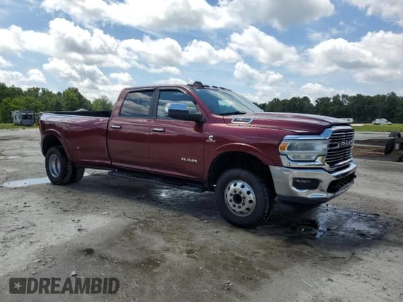 ✅ 2019 Ram 3500 Laramie • VIN: 3C63RRJL6KG719548 • Lot: 61183825. Listed on Copart with 118,931 mi. Free auction sales archive from the USA and detailed vehicle history report at DreamBid. Image 4.