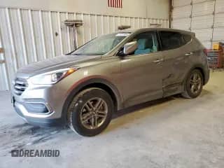 2018 Hyundai Santa Fe 2.4L with VIN 5NMZT3LB0JH081208, listed as a Copart auction lot 71311505 with 147,017 mi miles and Salvage title. Bid and sale history available at DreamBid. Image 1.